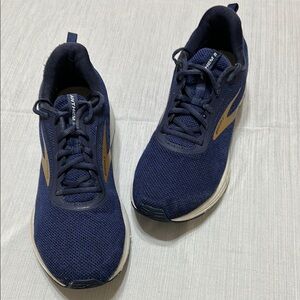 Brooks Blue and Gold Athletic Sneakers with‎ Sleek Design